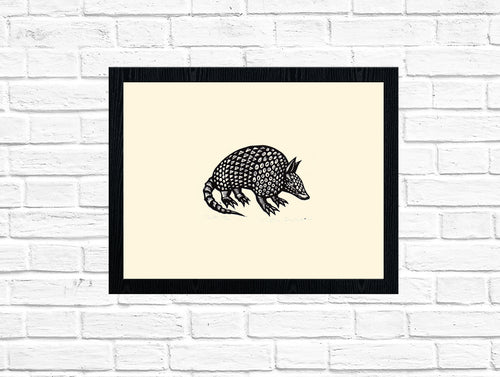 Armadillo Linocut Print shown in frame