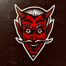 Load image into Gallery viewer, Devil Sticker on Black Book background