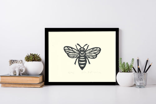 Bee Linocut Art Shown in Black Frame